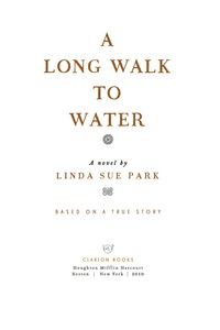 Cover image: A Long Walk to Water 9780547577319