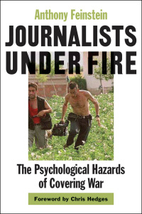Imagen de portada: Journalists under Fire 9780801884412