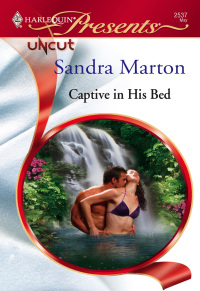 Cover image: Captive in His Bed 9780373125371