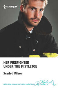 Cover image: Her Firefighter Under the Mistletoe 9780373069279