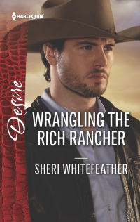 Cover image: Wrangling the Rich Rancher 9780373838837