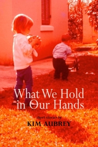 Cover image: What We Hold In Our Hands 9781927335338