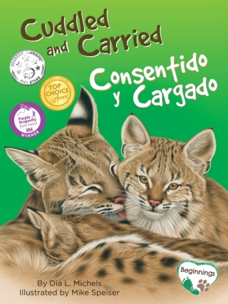 Cover image: Cuddled and Carried / Consentido y Cargado 9781930775657