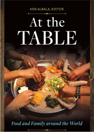 Imagen de portada: At the Table 1st edition 9781610697378